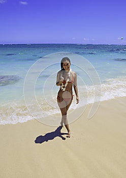 Girl lounging on the sand