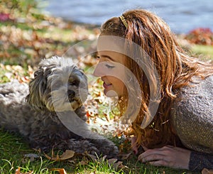 Girl loves shih-poo dog photo