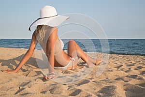 Girl lying on the beach