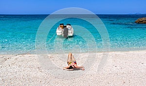 Girl lying on a beach