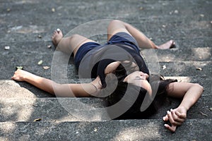 Girl lying down bare feet