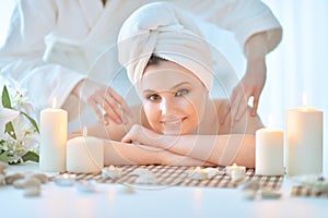 Girl lying down on a massage bed