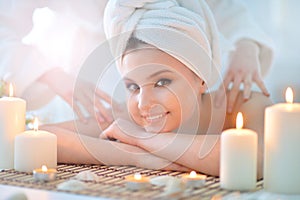 Girl lying down on a massage bed