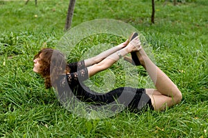 girl lying on grass