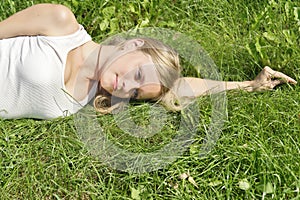 Girl lying on the grass