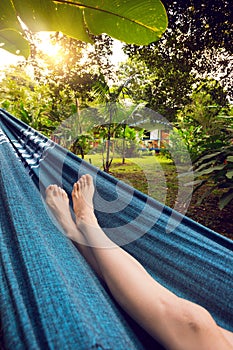 Girl lying in a hammock