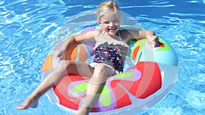 Girl lying on inflatable rubber