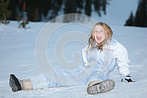 Girl lying on snow