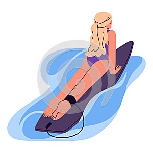 Girl lying on surfboard, swimming in ocean or sea water. Young woman surfing on board, relaxing on summer holidays