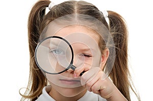 Girl with magnifying glass