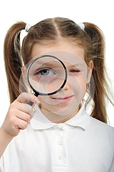 Girl with magnifying glass