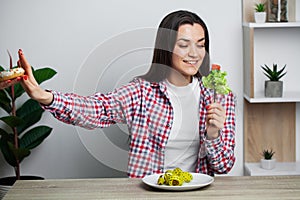 Girl makes a choice between healthy and harmful food