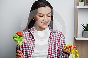 Girl makes a choice between healthy and harmful food