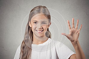 Girl making five times sign gesture with hand