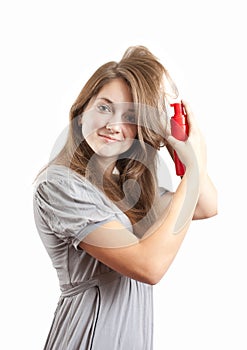 Girl making a hairdo