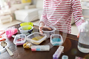 Girl making homemade slime toy