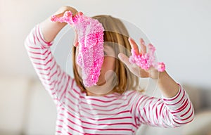 Girl making homemade slime toy