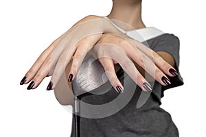 Girl with manicured fingernails and a golf club