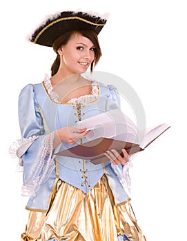 Girl in marquise dress and hat read book. photo
