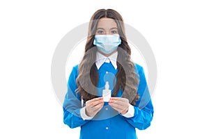 Girl in mask hold nasal drops. child presenting nasal spray. runny nose coronavirus symptom. flu sars therapy. covid