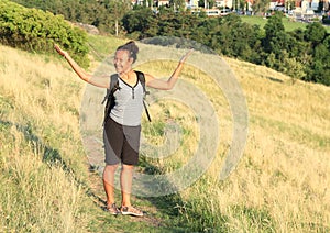 Girl on meadow in Divoka Sarka in Prague