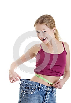 Girl measuring her waist