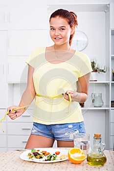 Girl with measuring tape