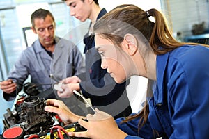 Girl in mechanics class