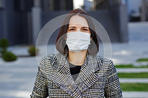 Girl in a medical mask. Stay at home. Pandemic coronavirus. COVI