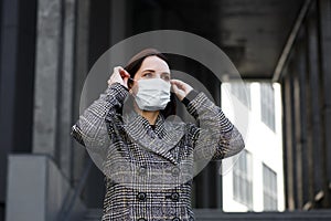 Girl in a medical mask. Stay at home. Pandemic coronavirus. COVI