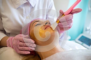 girl in a medical spa came for chemical peeling of the body and cosmetic treatment of acne.
