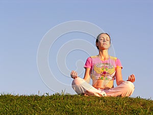 Girl meditation blue sky