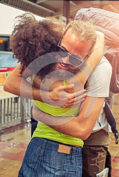 Girl meeting his boyfriend at the bus station