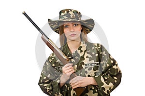 The girl in military uniform holding the gun isolated on white