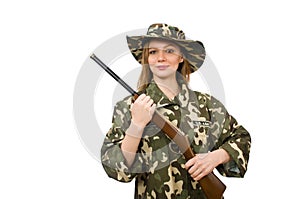 The girl in military uniform holding the gun isolated on white