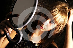Girl at the mirror