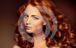 Girl model with long curly red hair.