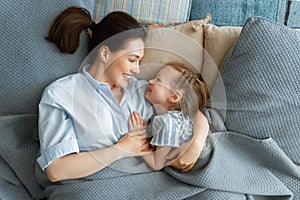 Girl and mother enjoy sunny morning