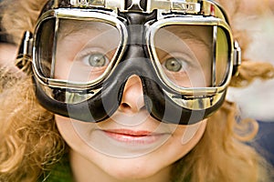 Girl in motorcycle glasses