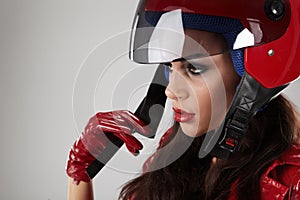 Girl with a motorcycle helmet