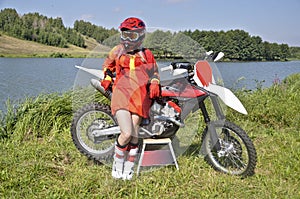 A girl and a motorcycle MX by Lake