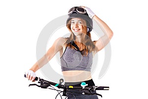 Girl with a mountain bike and helmet