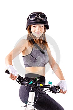 Girl with a mountain bike and helmet