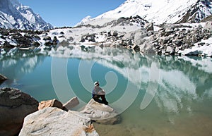 Girl on mountain lake