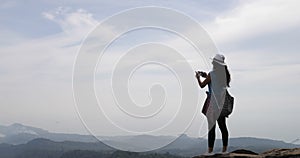 Girl On Mountain Top, Female Tourist Taking Photo Of Morning Landscape With Sunrise On Cell Smart Phone