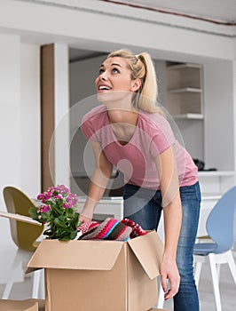 Girl moving in the new apartment