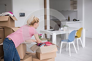 Girl moving in the new apartment