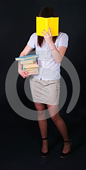 The girl with multi-colored books