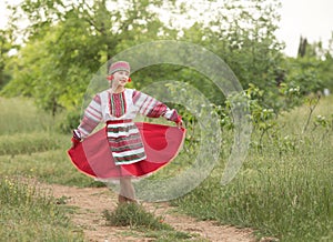 a girl in a national Belarusian costume