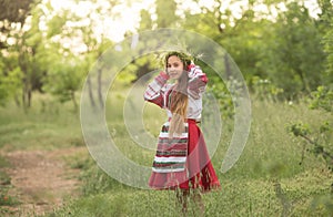 a girl in a national Belarusian costume